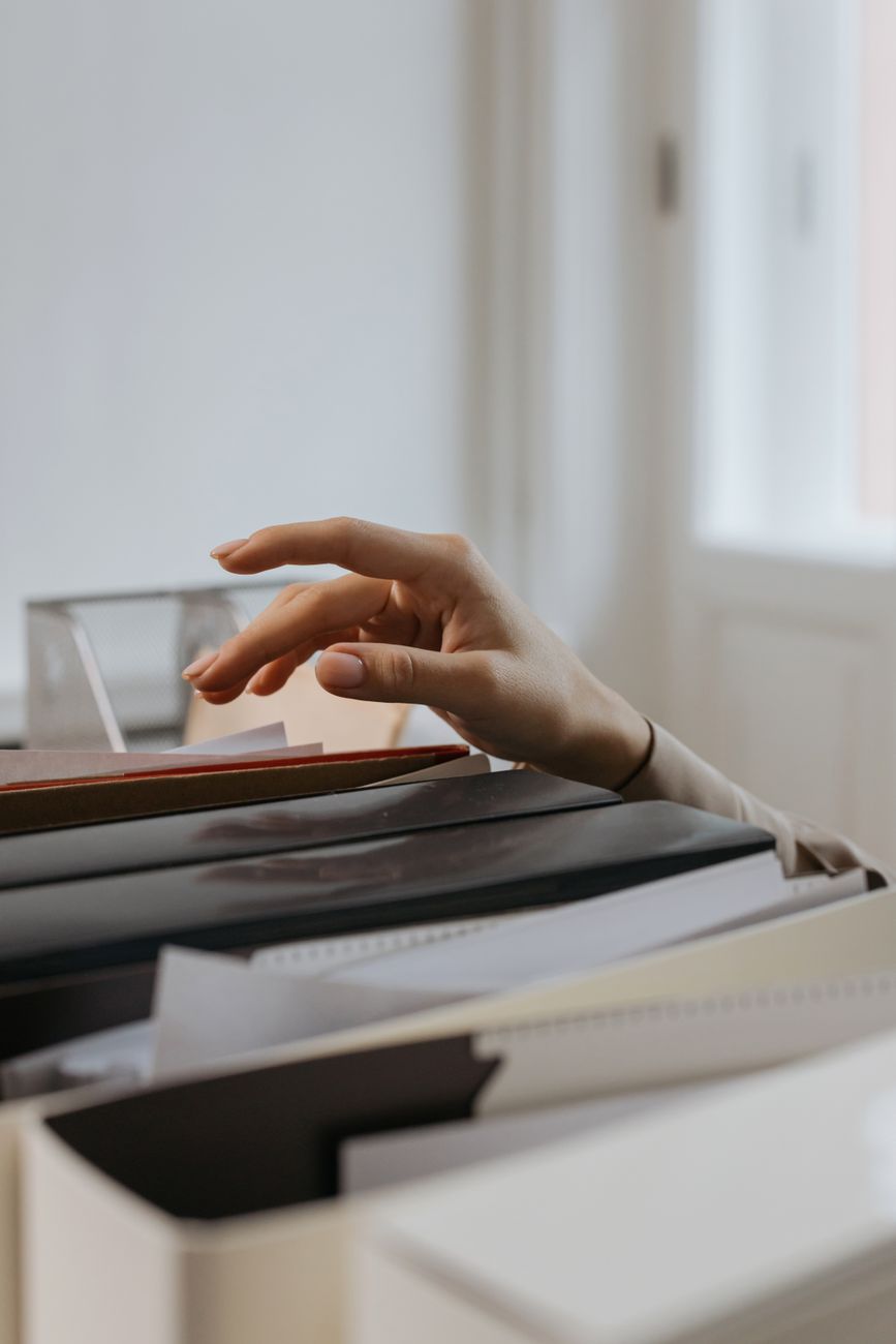 Business people with tablet computer checking invoices